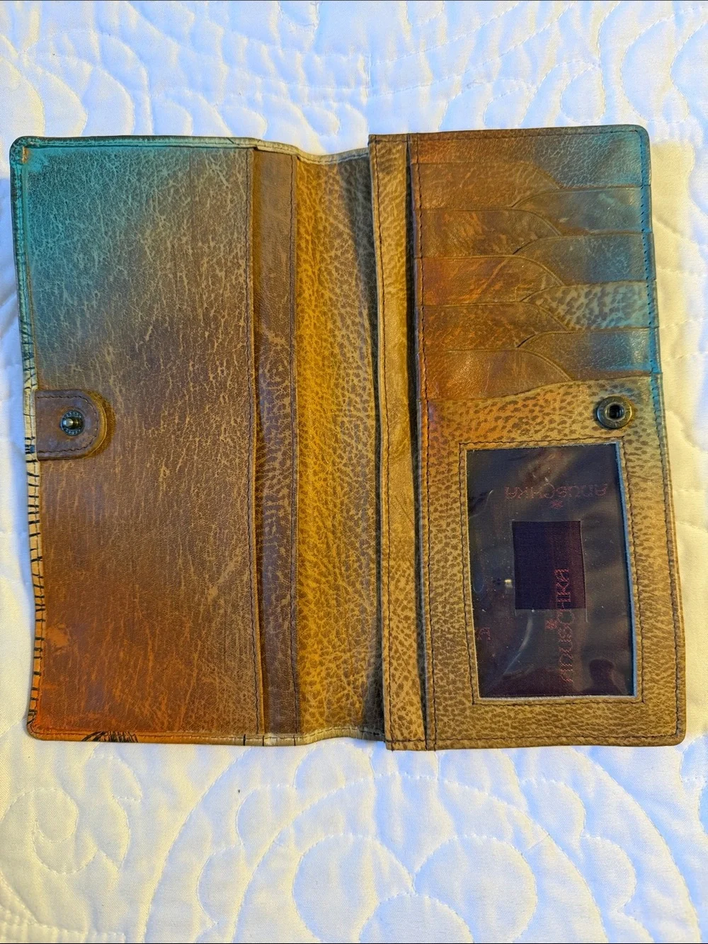 Anuschka hand-painted leather wallet featuring a vibrant 